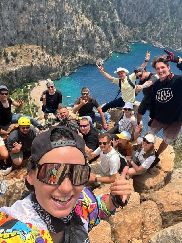 The group above a turquoise bay